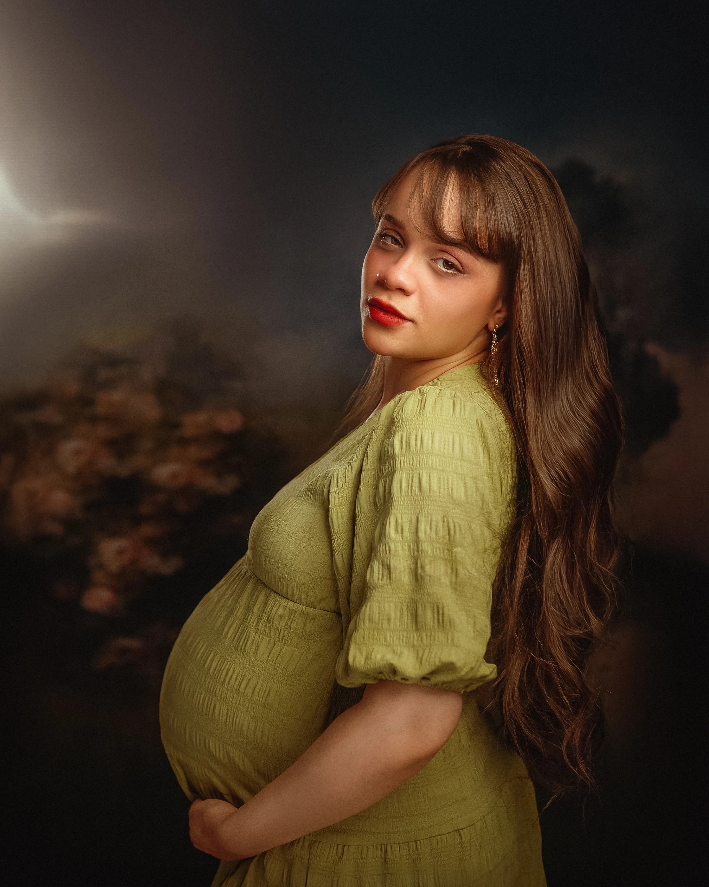 Retrato FineArt de maternidad, vestido verde.